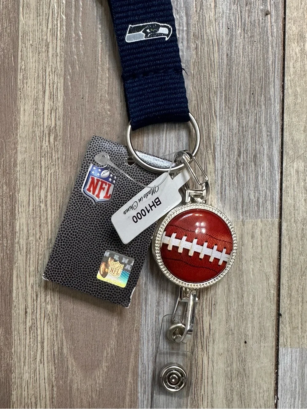 NFL Seattle Seahawks Navy Lanyard with Red Football Badge Reel NWT